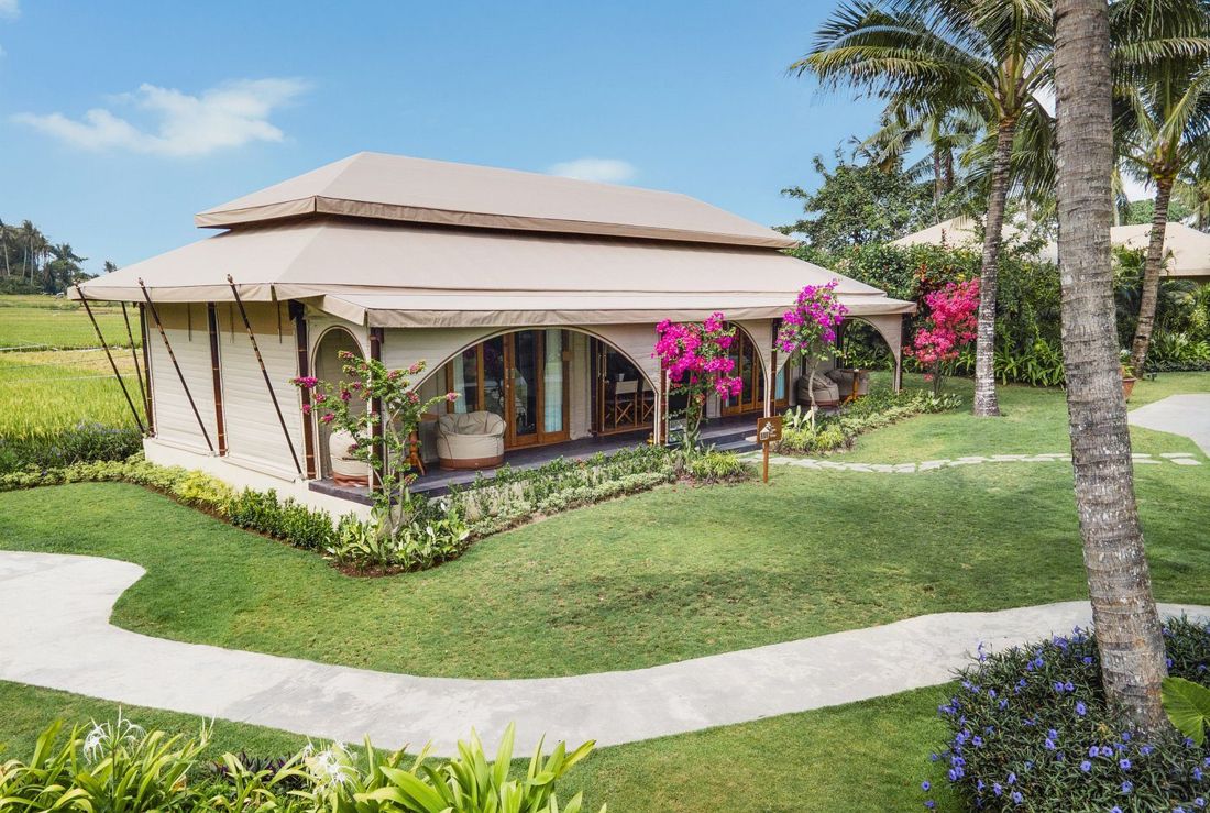 A glamping tent among the gardens and rice fields